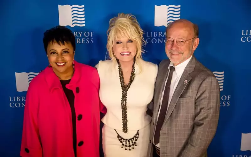 Photo of Librarian of Congress Carla Hayden, Dolly Parton, President of the Dollywood Foundation, David Dotson