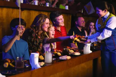 family enjoying Dolly Parton's Stampede