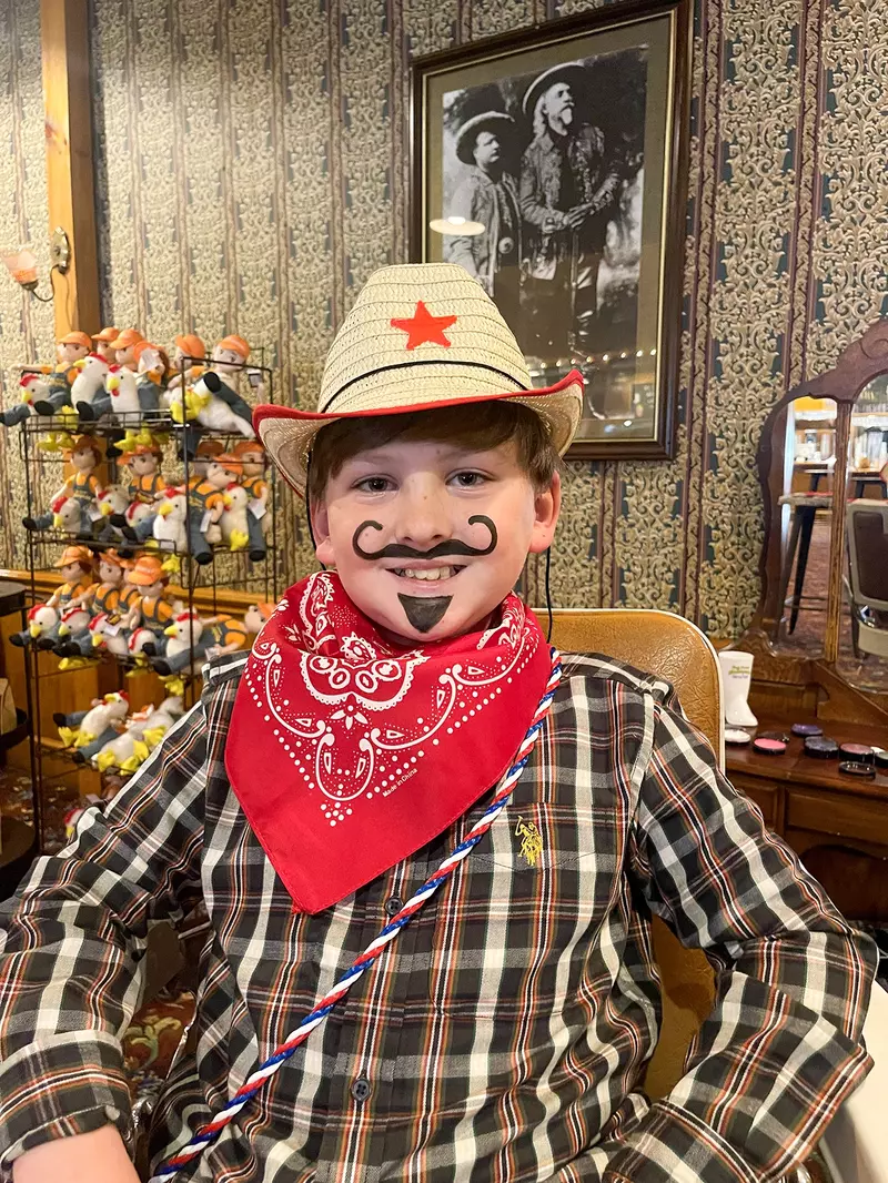 boy during cowboy makeover